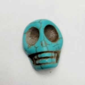 Tibetan Turquoise carved skulls